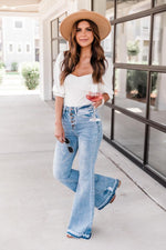 Load image into Gallery viewer, Donna Frayed Hem Medium Wash Flare Jeans
